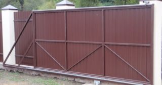 Купить откатные ворота из профнастила Сестрорецк, цена от 1755 руб.